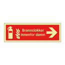 Brannslokker innenfor døren
