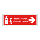 Brannslukker innenfor døren