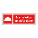 Brannslokker innenfor døren