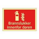 Brannslukker innenfor døren