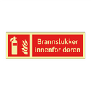Brannslukker innenfor døren
