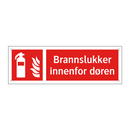 Brannslukker innenfor døren