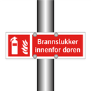 Brannslukker innenfor døren