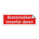 Brannslokker innenfor døren