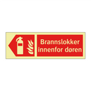 Brannslokker innenfor døren