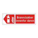 Brannslukker innenfor døren