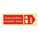 Brannslukker innenfor døren