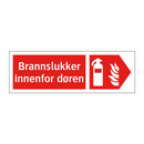 Brannslukker innenfor døren