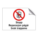 Stopp reparasjon pågår bruk trappene
