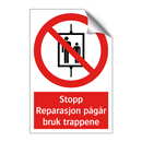Stopp reparasjon pågår bruk trappene