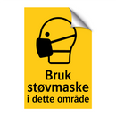 Bruk støvmaske i dette området