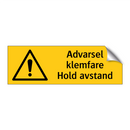 Advarsel klemfare hold avstand