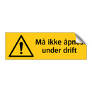 Må ikke åpnes under drift