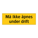 Må ikke åpnes under drift